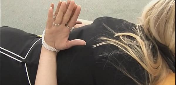  girl hogtied with palms facing out